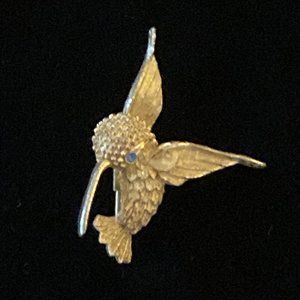 Vintage J.J. Jonette Gold Tone Tiny Hummingbird Brooch with Blue Rhinestone Eye